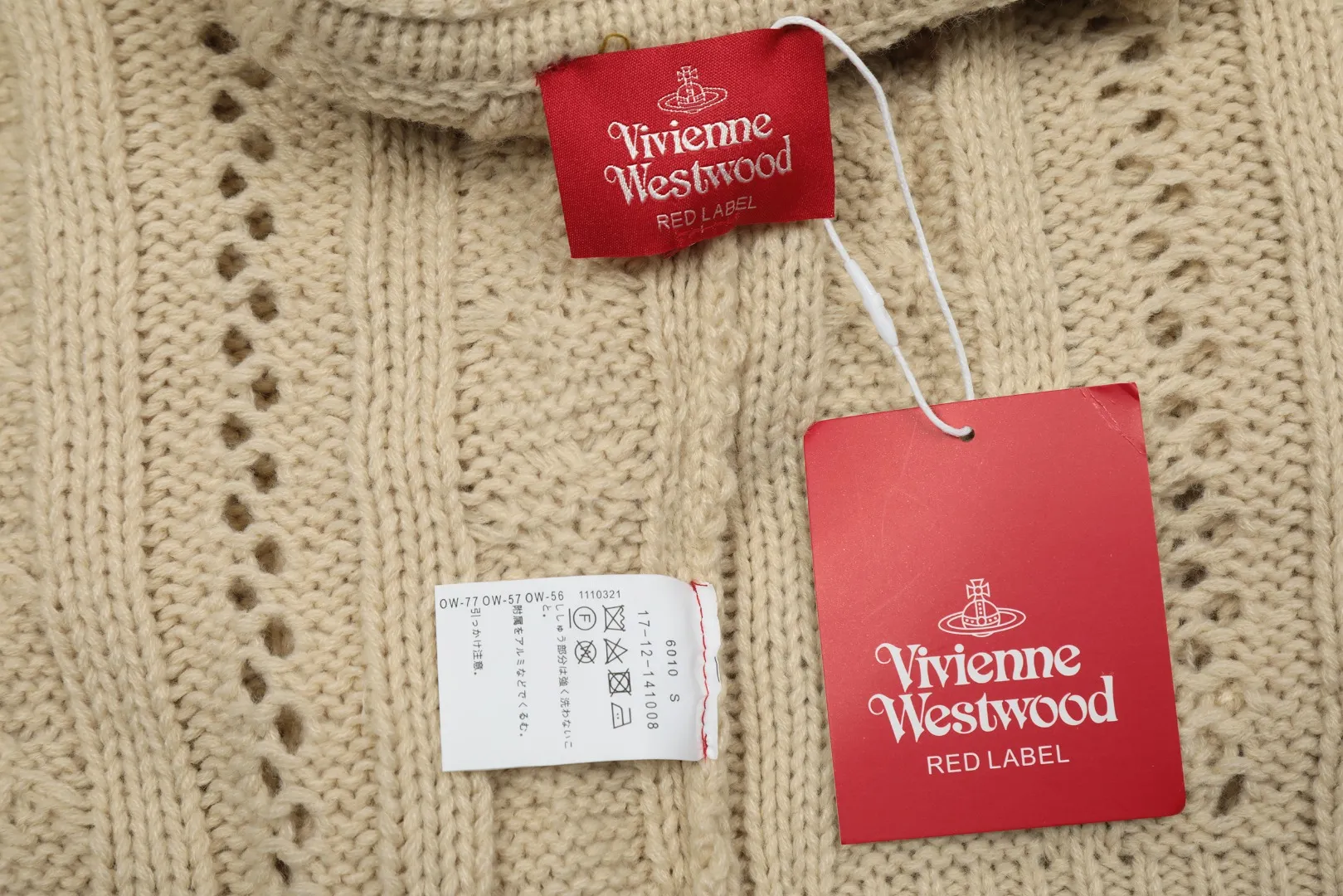 vivienne west wood West Queen Vivian Saturn New Retro "Unisex" Hollow Knitted Sweater Wool Cardigan 2024 Spring Latest Style Size: S -M- L Color: Apricot Black